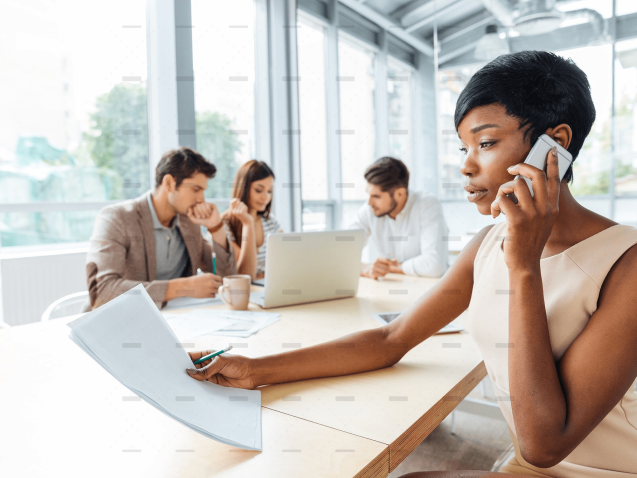 demo-attachment-478-serious-businesswoman-with-documents-talking-on-P9Q6LX6